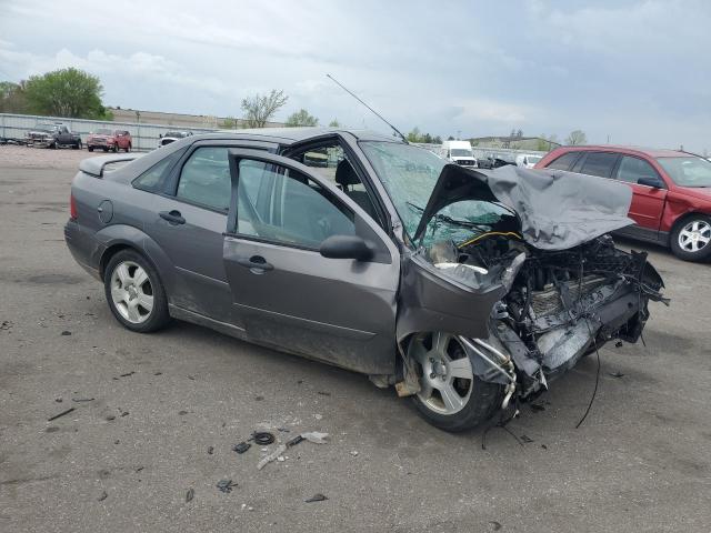 1FAHP34N17W185033 - 2007 FORD FOCUS ZX4 GRAY photo 4