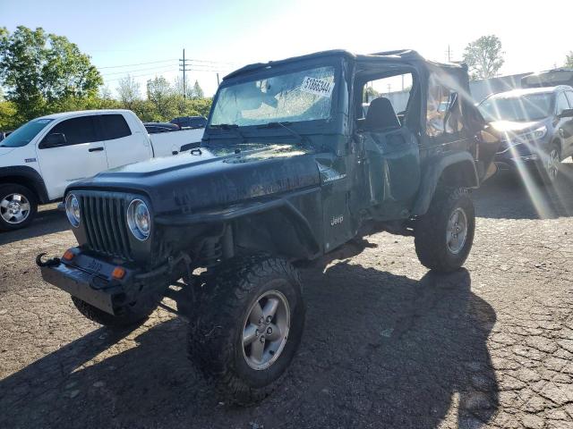 1J4FA29P8YP772696 - 2000 JEEP WRANGLER / SE GREEN photo 1