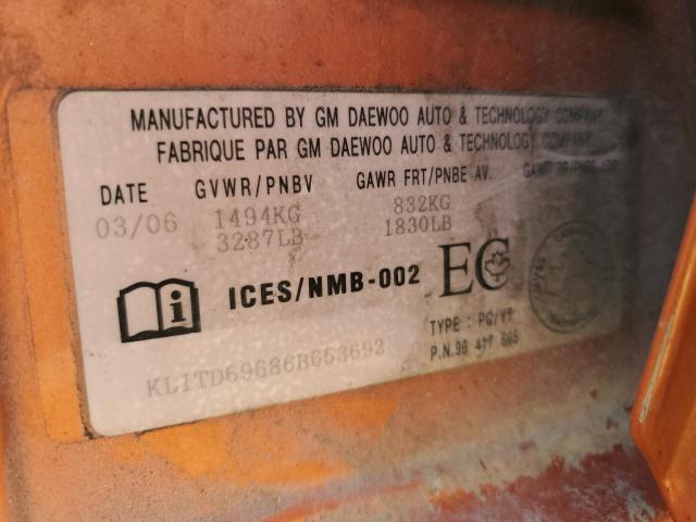 KL1TD69686B653692 - 2006 CHEVROLET AVEO BASE ORANGE photo 12