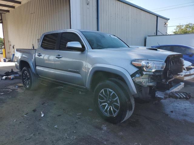 3TMAZ5CN7PM208155 - 2023 TOYOTA TACOMA DOUBLE CAB SILVER photo 4