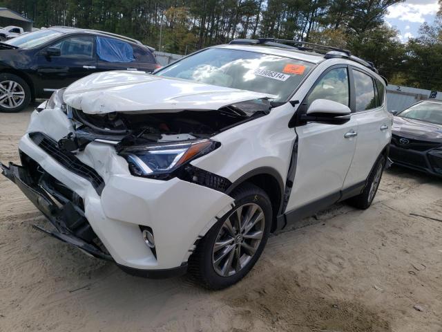 JTMDFREV9JD226766 - 2018 TOYOTA RAV4 LIMITED WHITE photo 1