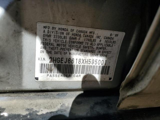 2HGEJ6618XH595001 - 1999 HONDA CIVIC BASE SILVER photo 11