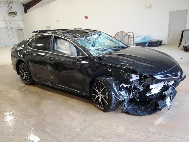 4T1G11AKXRU205277 - 2024 TOYOTA CAMRY SE NIGHT SHADE BLACK photo 4