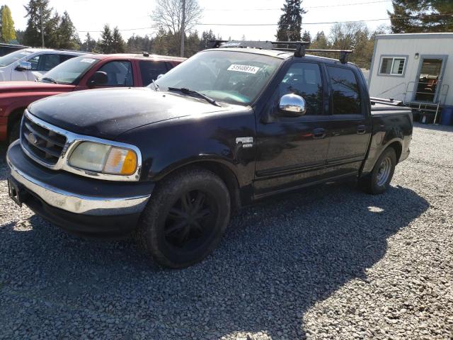 1FTRW07L52KC45227 - 2002 FORD F150 SUPERCREW BLACK photo 1