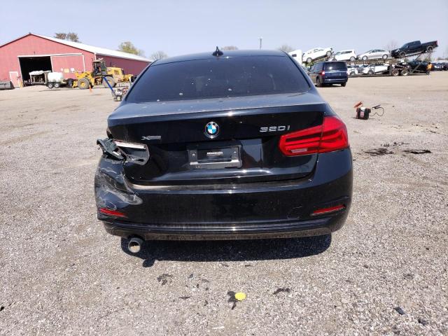 WBA8E5G55HNU22750 - 2017 BMW 320 XI BLACK photo 6