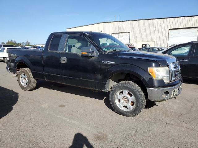 1FTPX14V09FA02637 - 2009 FORD F150 SUPER CAB BLACK photo 4