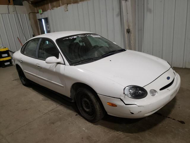 1FAFP53U6XG290169 - 1999 FORD TAURUS SE WHITE photo 4