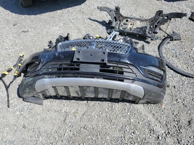 5LMCJ3C98KUL22377 - 2019 LINCOLN MKC RESERVE შავი ფოტო 13