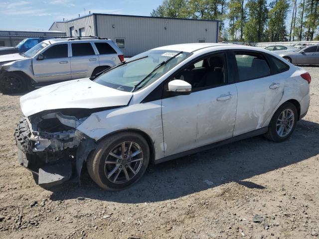 1FADP3F28FL204517 - 2015 FORD FOCUS SE WHITE photo 1