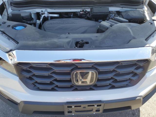 5FNYF8H54PB029786 - 2023 HONDA PASSPORT EXL WHITE photo 12