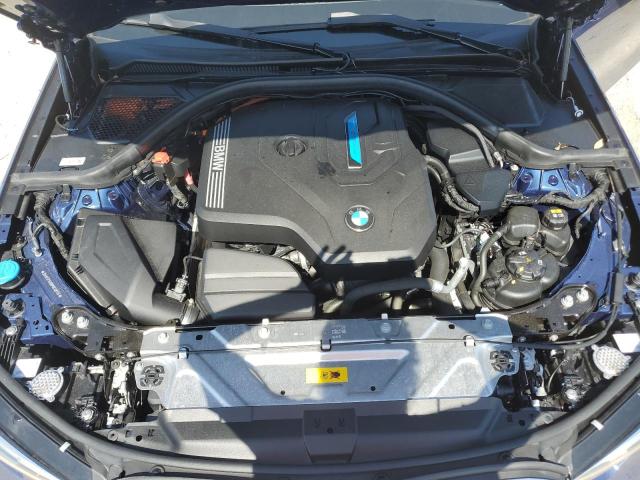 3MW5P9J08M8C02176 - 2021 BMW 330XE Blau Foto 11