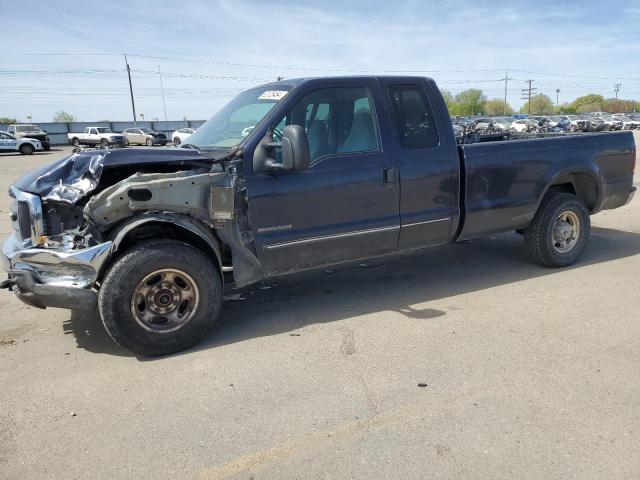 1FTNX20F7XEE89110 - 1999 FORD F250 SUPER DUTY BLUE photo 1