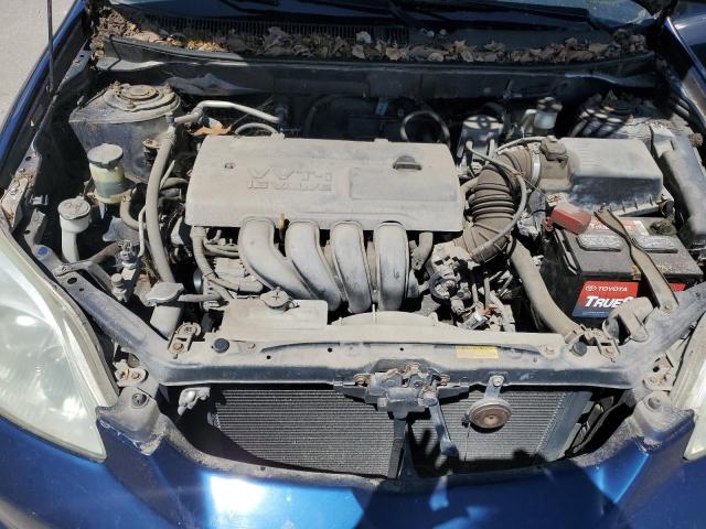 2T1KR32E03C052117 - 2003 TOYOTA COROLLA MA XR BLUE photo 11