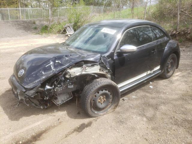 3VWJX7AT7DM660845 - 2013 VOLKSWAGEN BEETLE BLACK photo 1