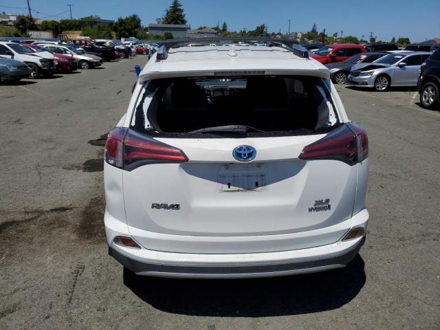 JTMRJREV0GD033872 - 2016 TOYOTA RAV4 HV XLE WHITE photo 6