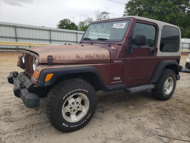 1J4FA49S43P303677 - 2003 JEEP WRANGLER / SPORT MAROON photo 1