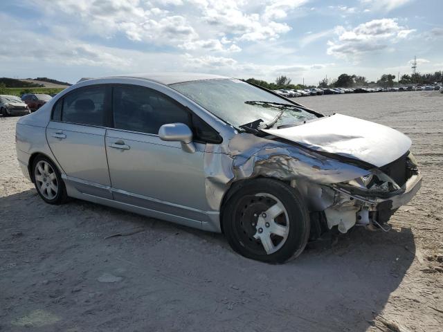 1HGFA16566L077769 - 2006 HONDA CIVIC LX SILVER photo 4