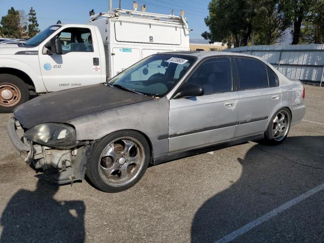 2HGEJ6612YH577711 - 2000 HONDA CIVIC BASE SILVER photo 1