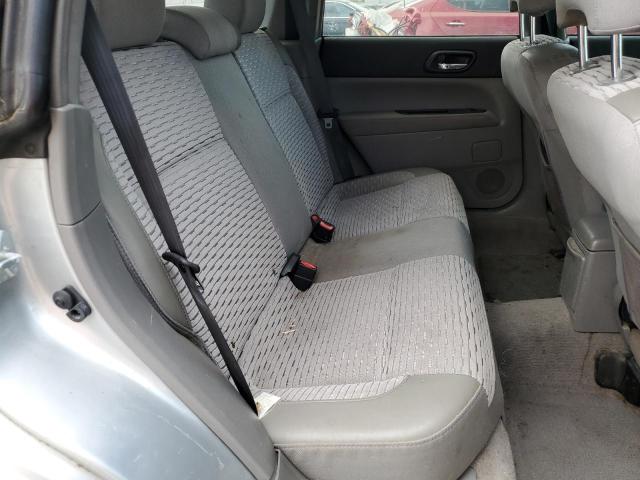 JF1SG65654H740306 - 2004 SUBARU FORESTER 2.5XS Серебристый фото 11