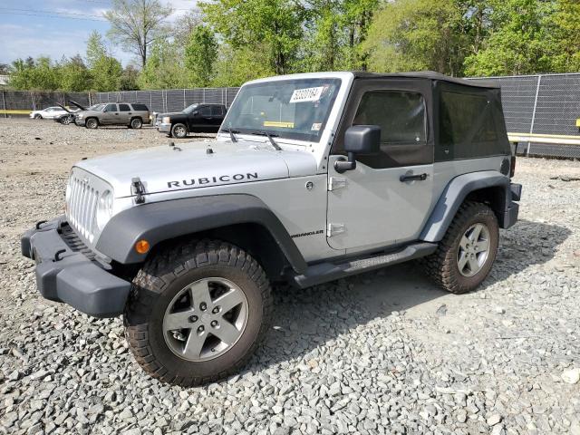 1C4HJWCG2CL128688 - 2012 JEEP WRANGLER RUBICON SILVER photo 1