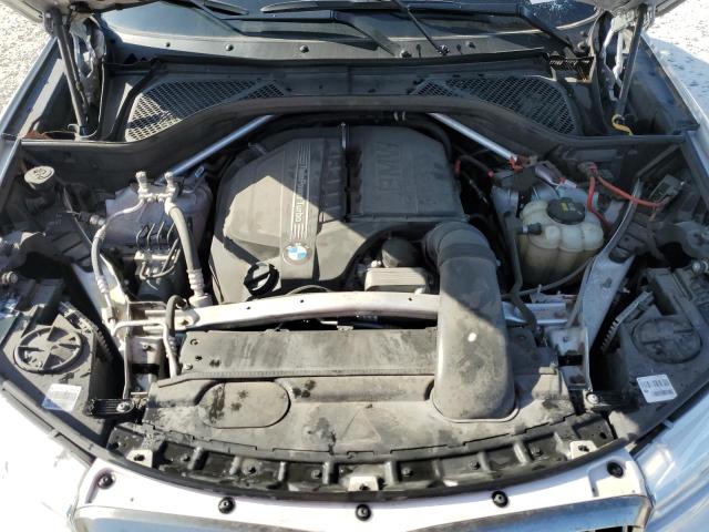 5UXKU0C59K0S97422 - 2019 BMW X6 SDRIVE35I WHITE photo 12