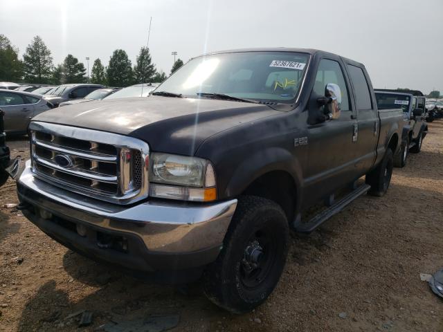 1FTNW21L24EA83299 - 2004 FORD F250 SUPER BLACK photo 2