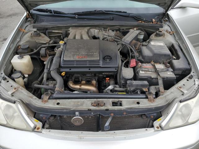 4T1BF28BXYU014335 - 2000 TOYOTA AVALON XL SILVER photo 11