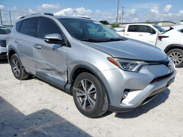 2T3WFREV6GW284886 - 2016 TOYOTA RAV4 XLE SILVER photo 4