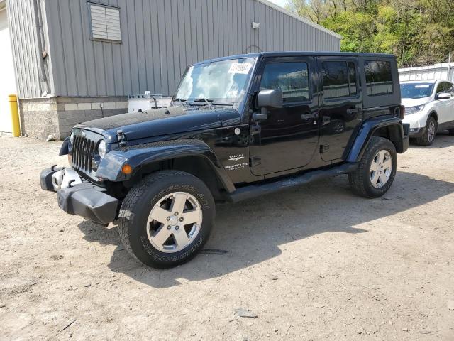 1J4BA5H15AL102386 - 2010 JEEP WRANGLER U SAHARA BLACK photo 1