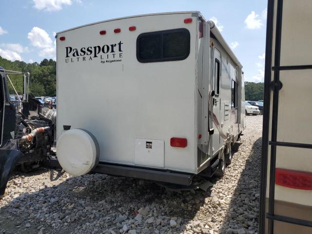 4YDT24524BX412289 - 2011 KEYSTONE PASSPORT WHITE photo 4