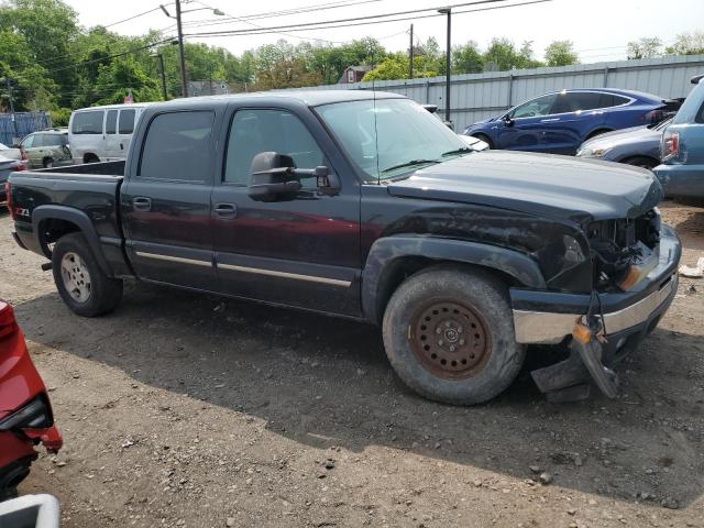 2GCEK13Z771108808 - 2007 CHEVROLET SILVERADO K1500 CLASSIC CREW CAB BLACK photo 4