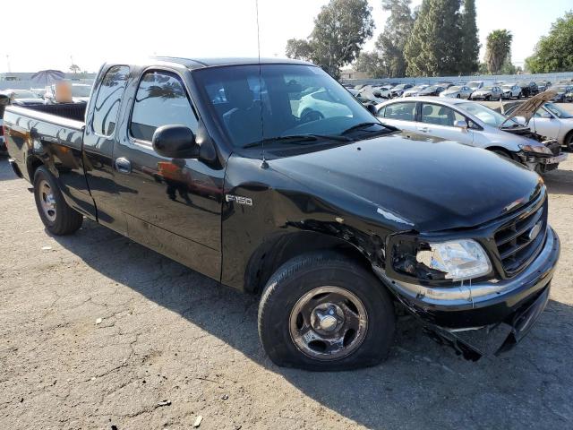 1FTZX17211KA28136 - 2001 FORD F150 BLACK photo 4