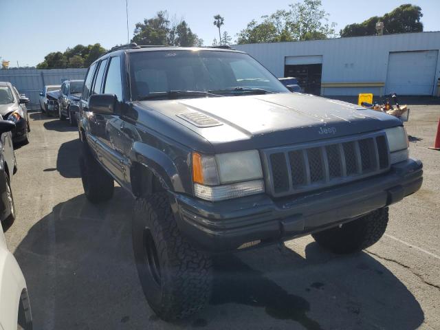 1J4GZ88Z4WC328805 - 1998 JEEP GRAND CHER LIMITED 5.9L GRAY photo 4