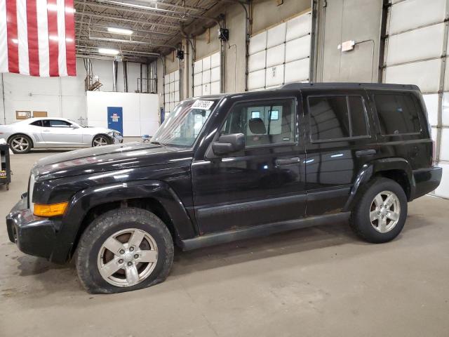 1J8HG48K06C231685 - 2006 JEEP COMMANDER BLACK photo 1