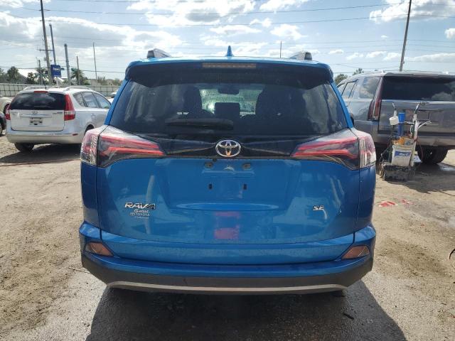 JTMNFREV1JJ156556 - 2018 TOYOTA RAV4 SE BLUE photo 6