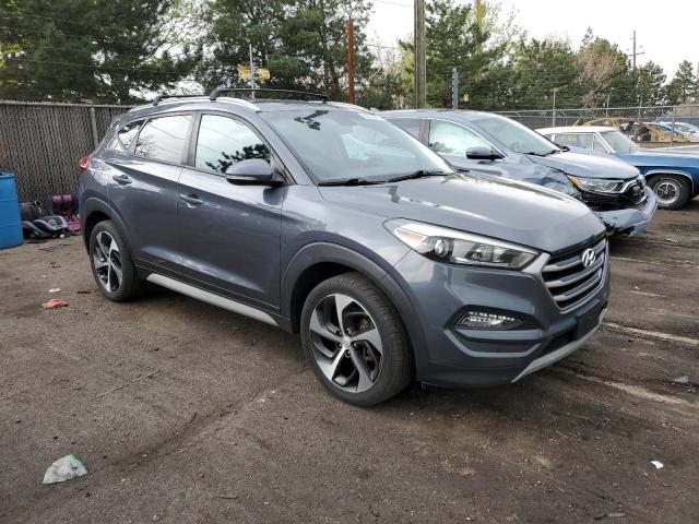 KM8J3CA2XHU385709 - 2017 HYUNDAI TUCSON LIMITED GRAY photo 4