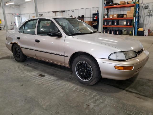 1Y1SK5267VZ444718 - 1997 CHEVROLET GEO PRIZM BASE TAN photo 4