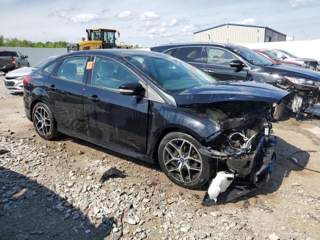 1FADP3F2XGL267619 - 2016 FORD FOCUS SE BLACK photo 4