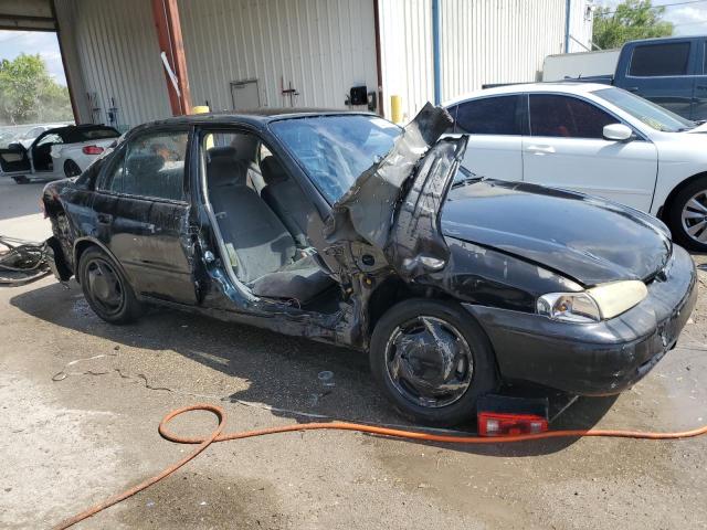 1Y1SK52851Z408411 - 2001 CHEVROLET GEO PRIZM BASE BLACK photo 4