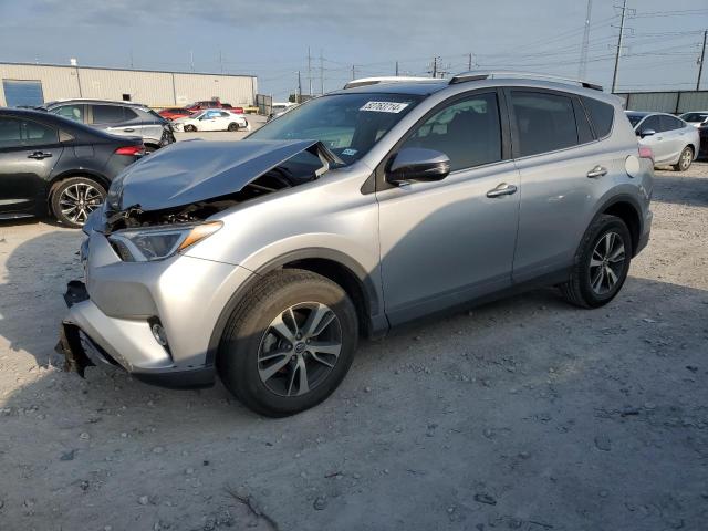 2T3WFREV0GW306137 - 2016 TOYOTA RAV4 XLE SILVER photo 1