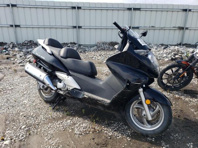 JH2PF0141CK900355 - 2012 HONDA FSC600 A BLACK photo 1