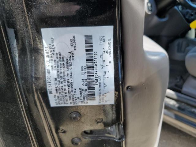 1FAFP34Z03W317185 - 2003 FORD FOCUS SE COMFORT BLACK photo 12