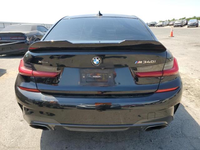 3MW5U9J07M8B57904 - 2021 BMW M340XI BLACK photo 6