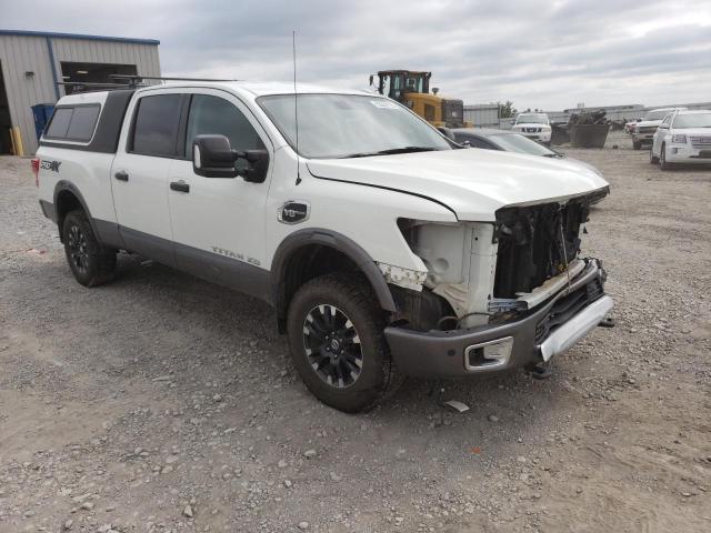 1N6AA1F4XHN567474 - 2017 NISSAN TITAN XD SL WHITE photo 4