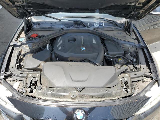 WBA8B9C59JEE82741 - 2018 BMW 330 I BLACK photo 11