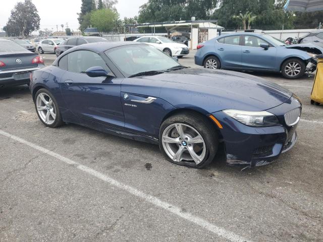 WBALM7C56CE384825 - 2012 BMW Z4 SDRIVE35I Синий фото 4
