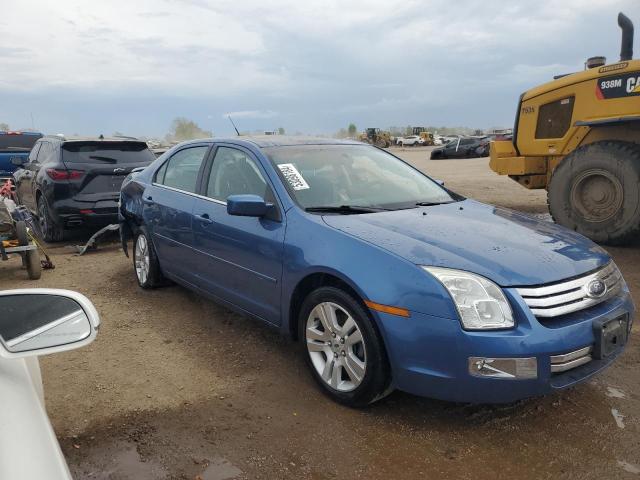 3FAHP08Z29R135890 - 2009 FORD FUSION SEL BLUE photo 4