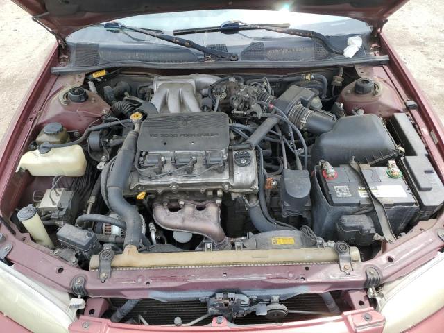 JT2BF22K1X0172350 - 1999 TOYOTA CAMRY LE RED photo 11