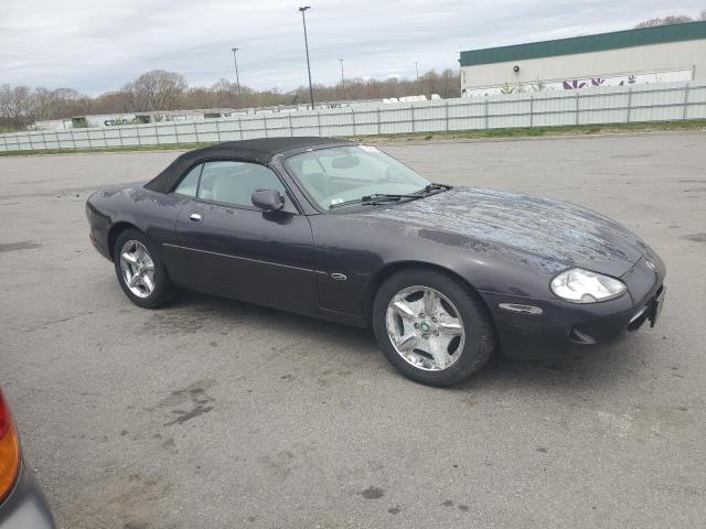 SAJGX204XXC033106 - 1999 JAGUAR XK8 BLACK photo 4