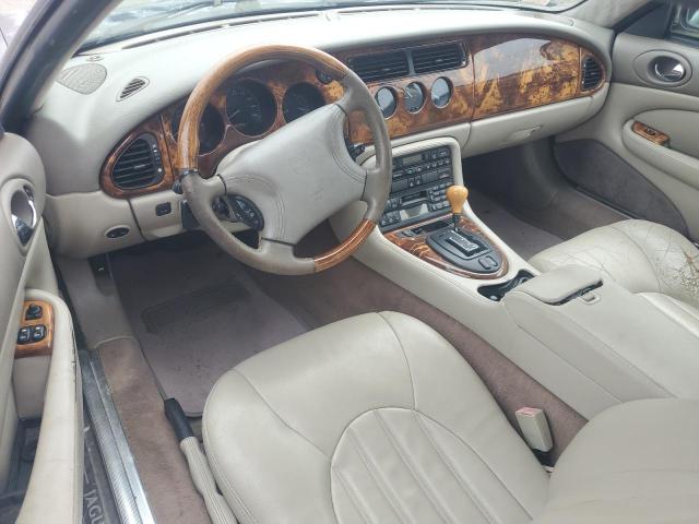 SAJGX204XXC033106 - 1999 JAGUAR XK8 BLACK photo 8